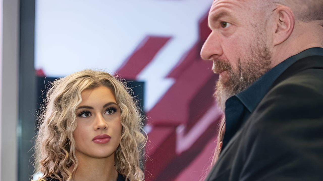 Meghan Walker with Triple H (via her X)