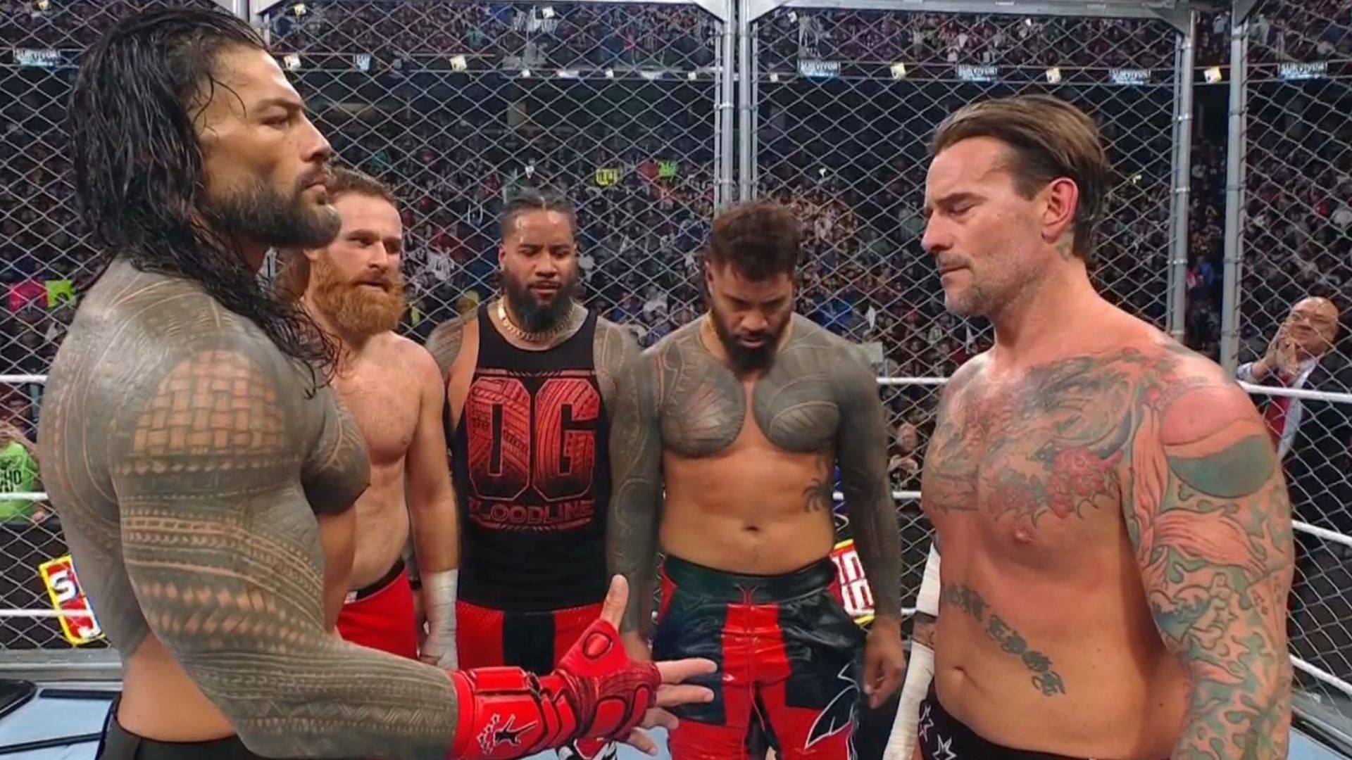 Roman Reigns offers his hand to CM Punk. (Image via SonyLIV.com)