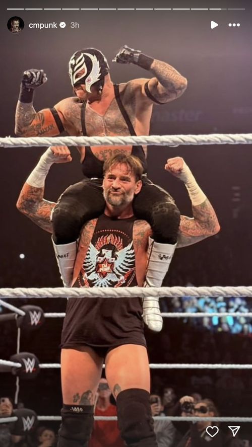 CM Punk with Rey Mysterio on his shoulders [Image: Screenshot via Instagram]