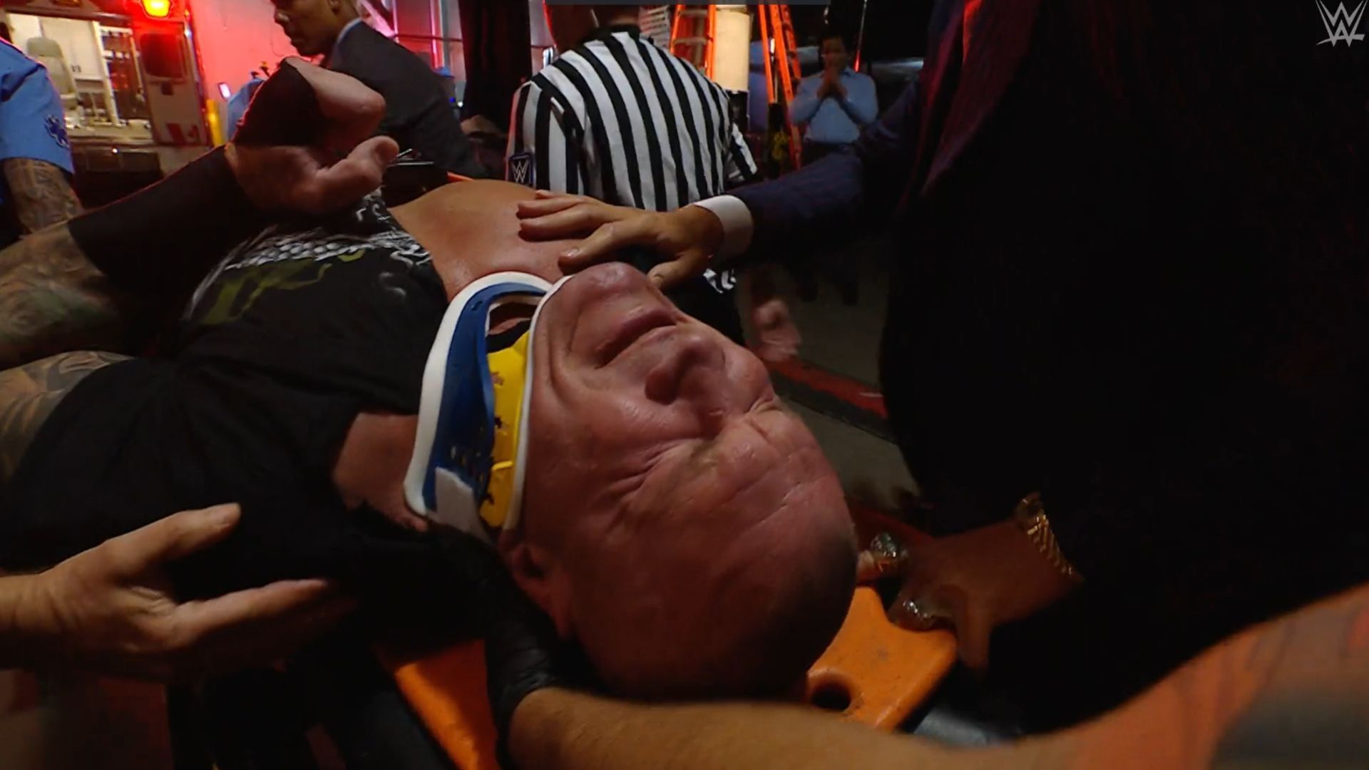 Randy Orton being taken out on a stretcher to an ambulance after Kevin Owens hit him with a Piledriver [Image Credits: WWE.com]