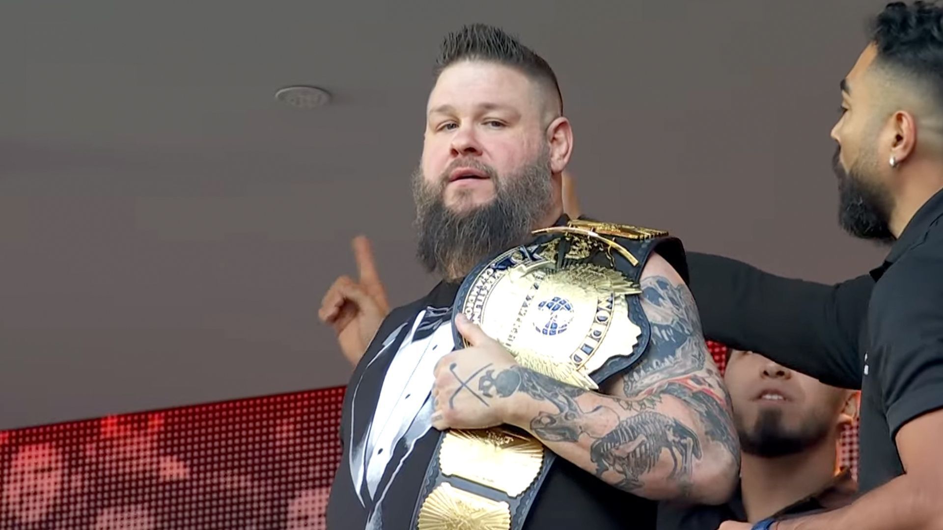 Kevin Owens with the Winged Eagle version of the WWE Championship