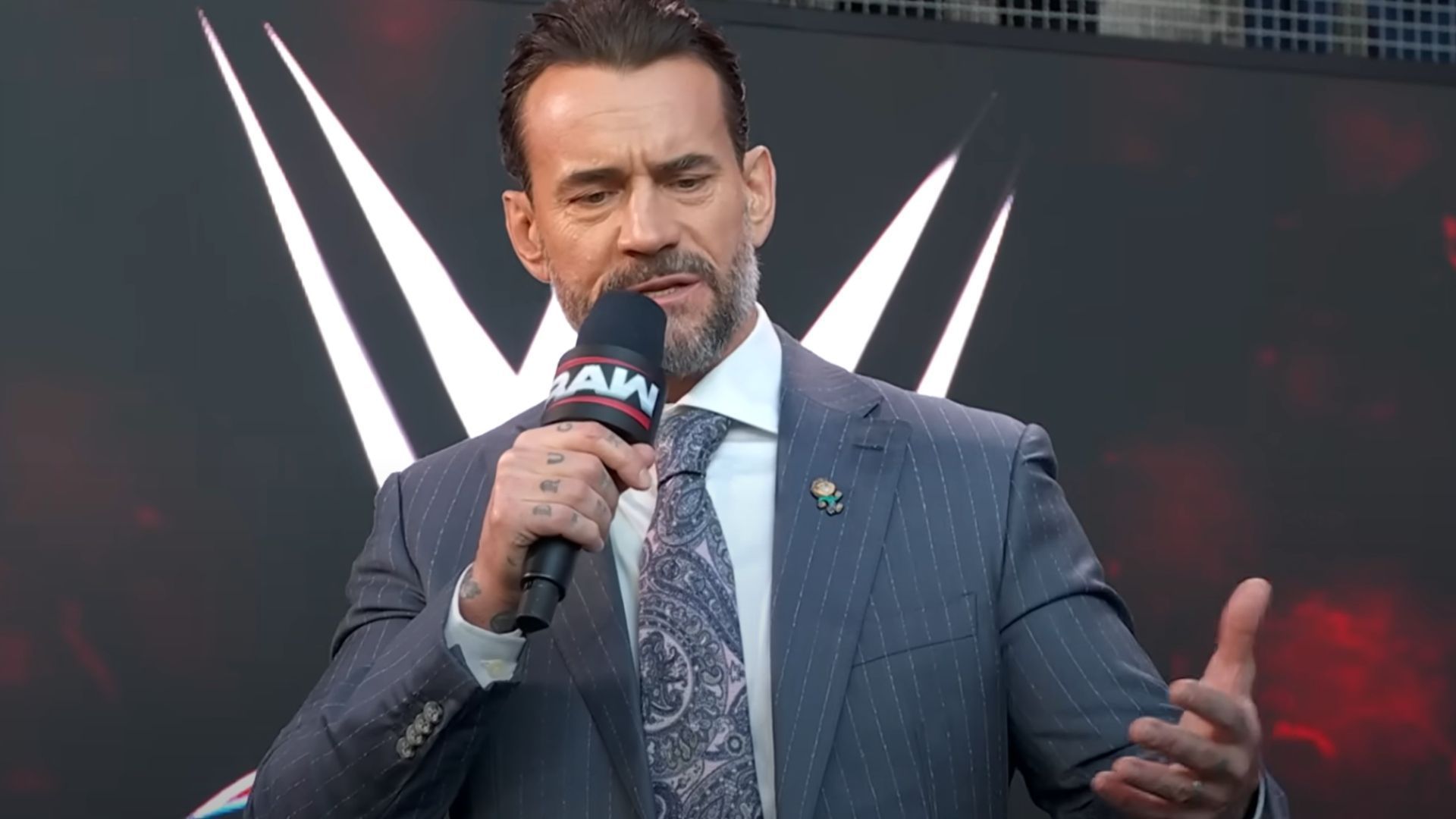 CM Punk speaking at the kickoff show of RAW