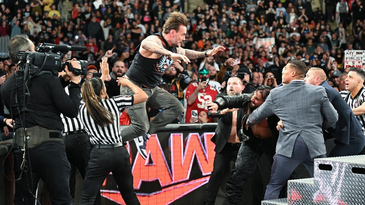 CM Punk and Seth Rollins brawl (Photo credit: WWE.com)