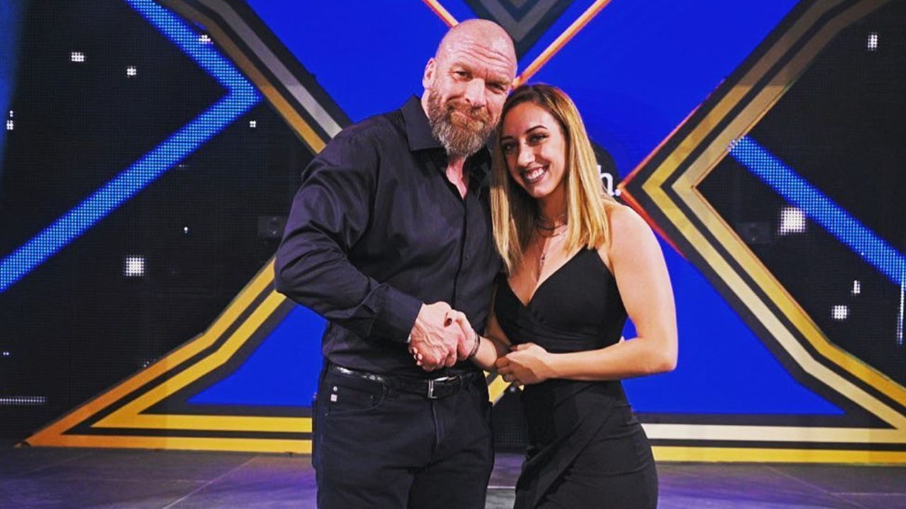 Jacy Jayne pictured with WWE CCO Triple H (via her Instagram)