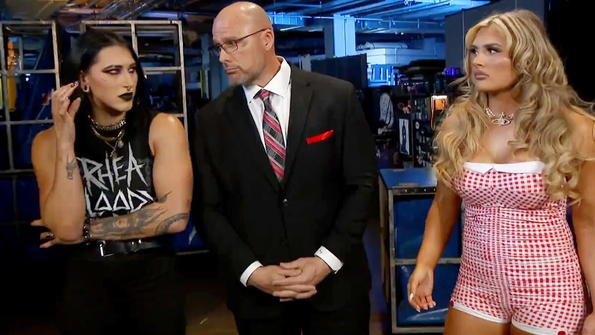 Rhea Ripley and Tiffany Stratton with Adam Pearce (Picture courtesy: WWE.com)