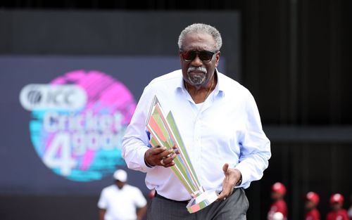 Clive Llyod with the 2024 T20 World Cup trophy in the West Indies. [Image credits: Getty]