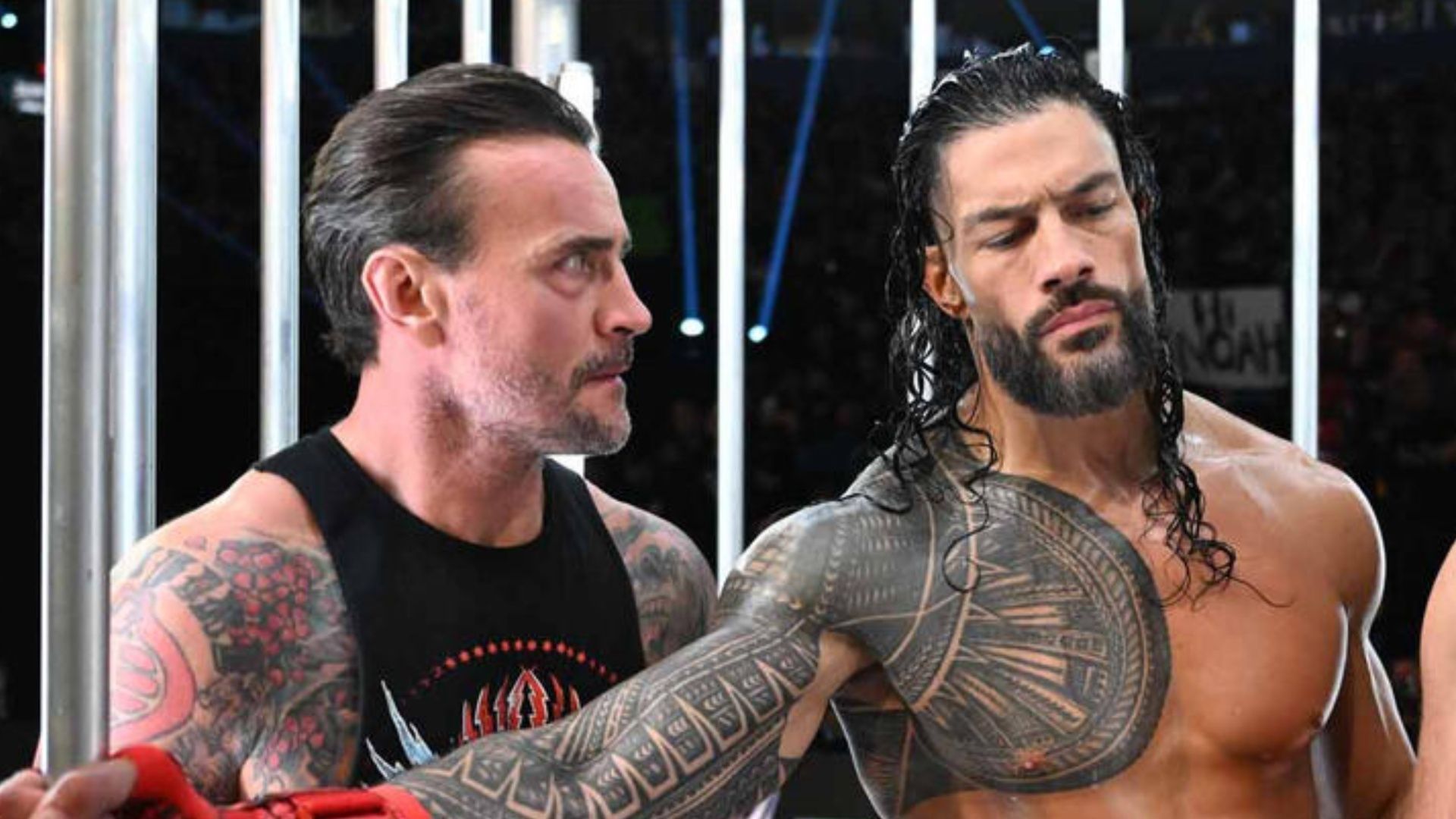 CM Punk and Roman Reigns during Survivor Series: WarGames. (Image credits: wwe.com)