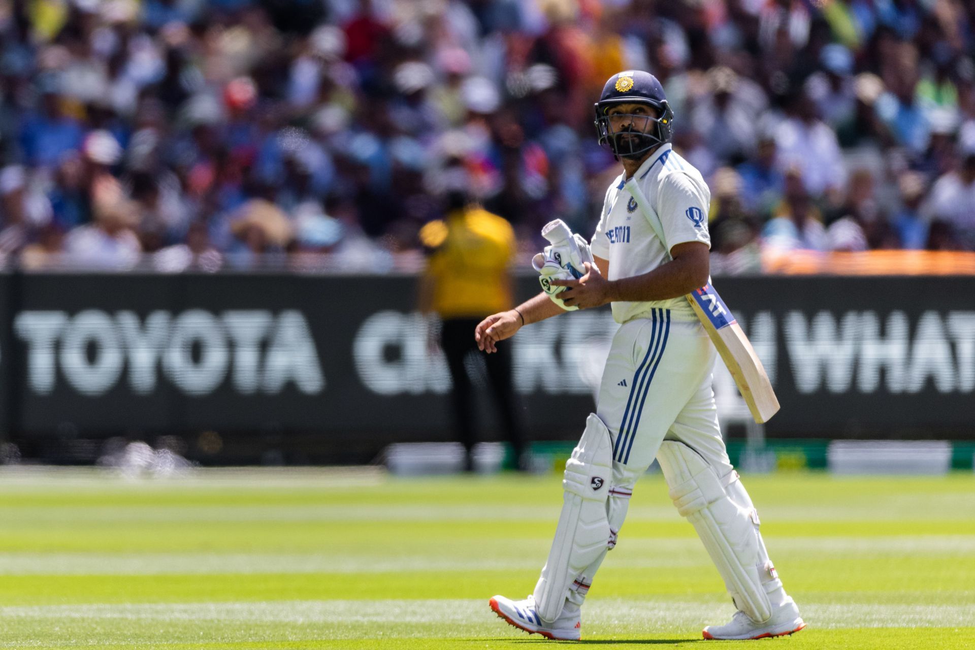 Rohit Sharma walks off the field after getting dismissed in Melbourne. Source: Getty