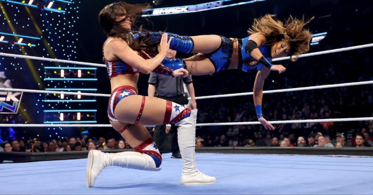 Michin hits Chelsea Green with a dropkick on WWE SmackDown (Image Credit WWE.com)