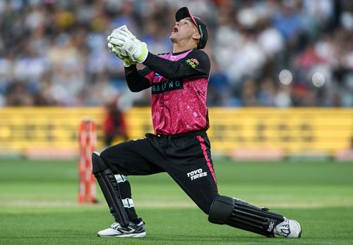 Josh Philippe of the Sixers catches Ollie Pope of the Strikers during the BBL match between Adelaide Strikers and Sydney Sixers at Adelaide Oval, on January 15, 2025, in Adelaide, Australia. (Photo by Mark Brake - CA/Cricket Australia via Getty Images)