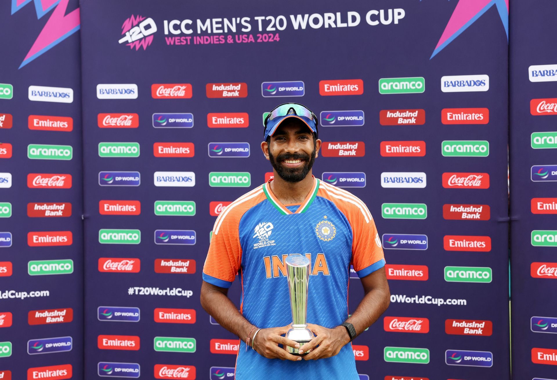 Jasprit Bumrah poses with the Man of the Series Trophy after India&#039;s World Cup win in 2024..Source: Getty