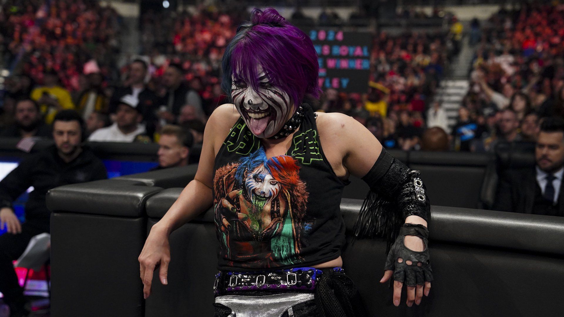 Asuka looks on from ringside at WWE SmackDown