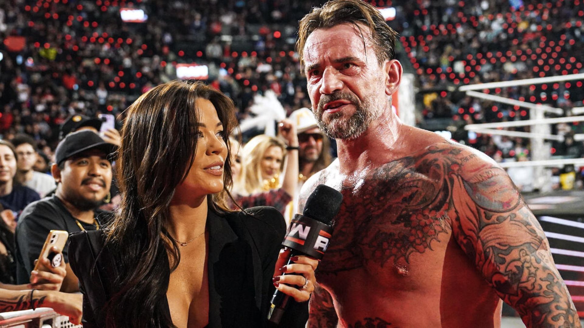 Jackie Redmond and CM Punk at the WWE RAW on Netflix premiere [Photo credit: WWE.com]