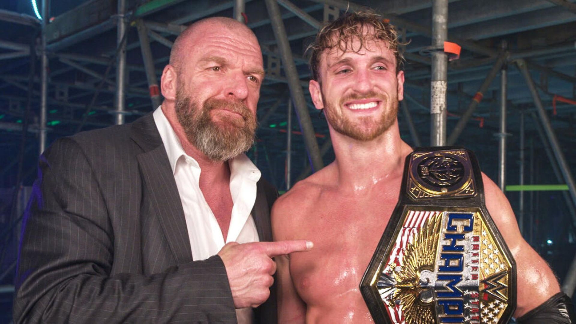 Triple H and Logan Paul (Image Credits: WWE.com)