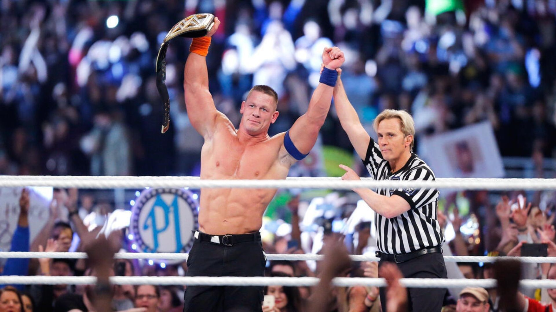 John Cena poses after winning his 16th world title at the 2017 Royal Rumble (Image via WWE.com).