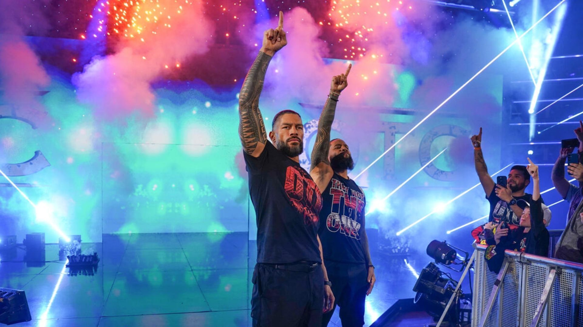 Roman Reigns and Jimmy Uso make their entrance at a SmackDown event. (Image via WWE.com)