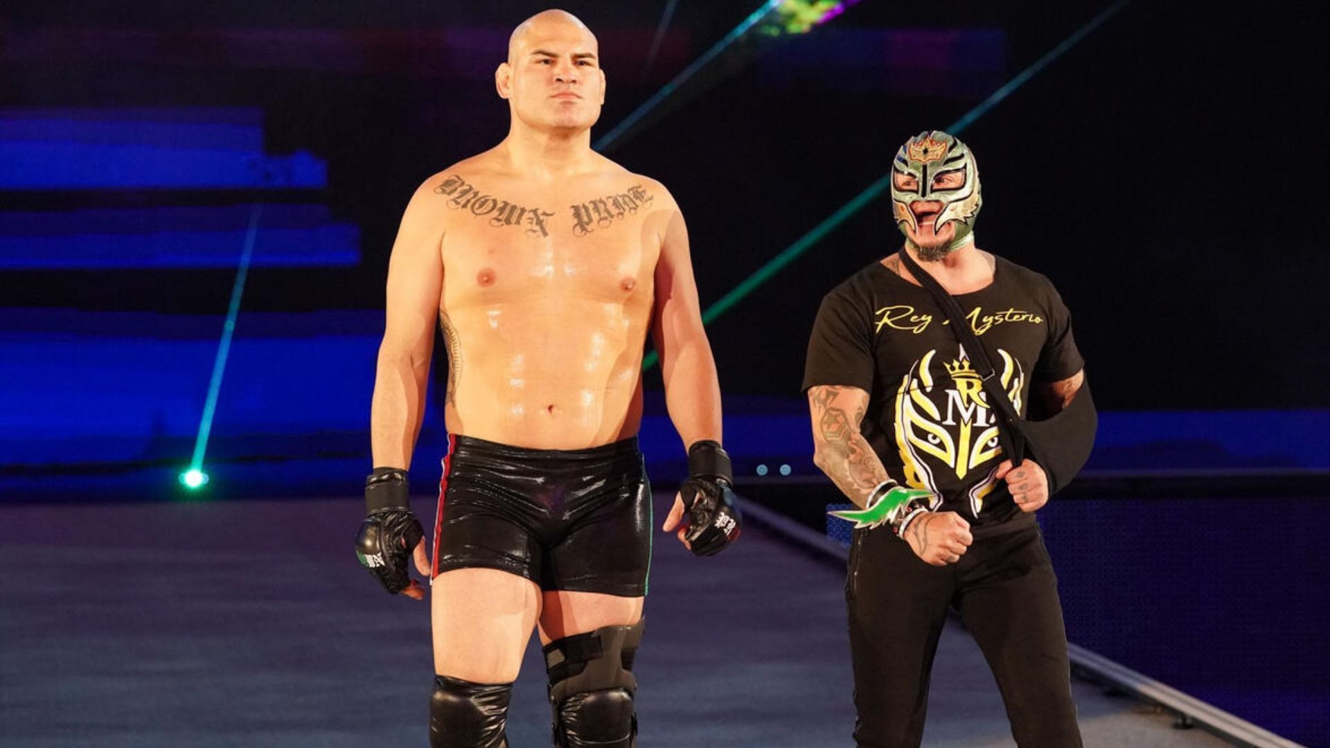 Cain Velasquez alongside Rey Mysterio [Image Credits: WWE.com]