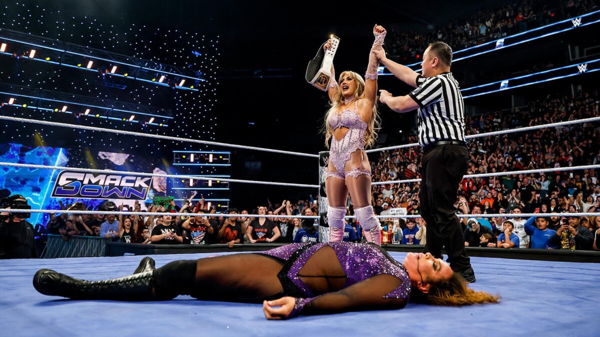 Tiffany Stratton celebrates after cashing-in her WWE Money in the Bank contract. (Image via WWE.com)