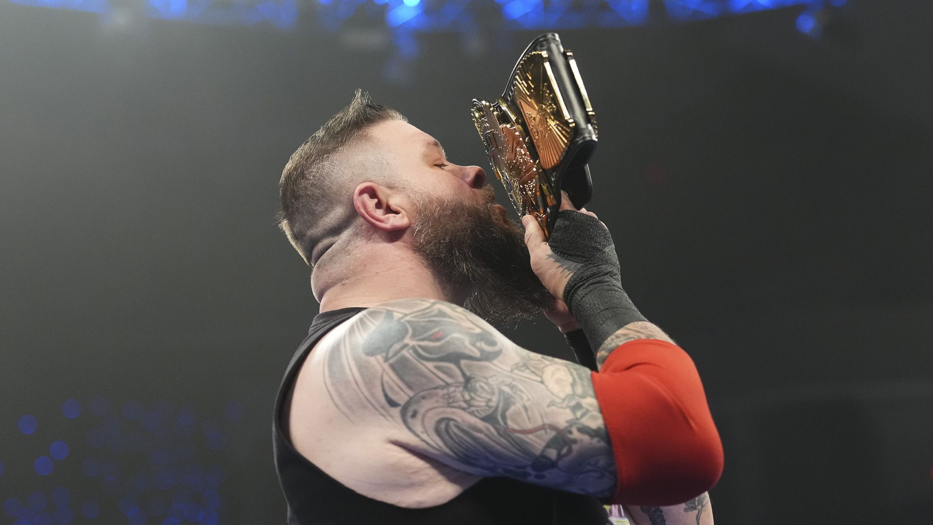 Kevin Owens kisses championship gold on WWE SmackDown