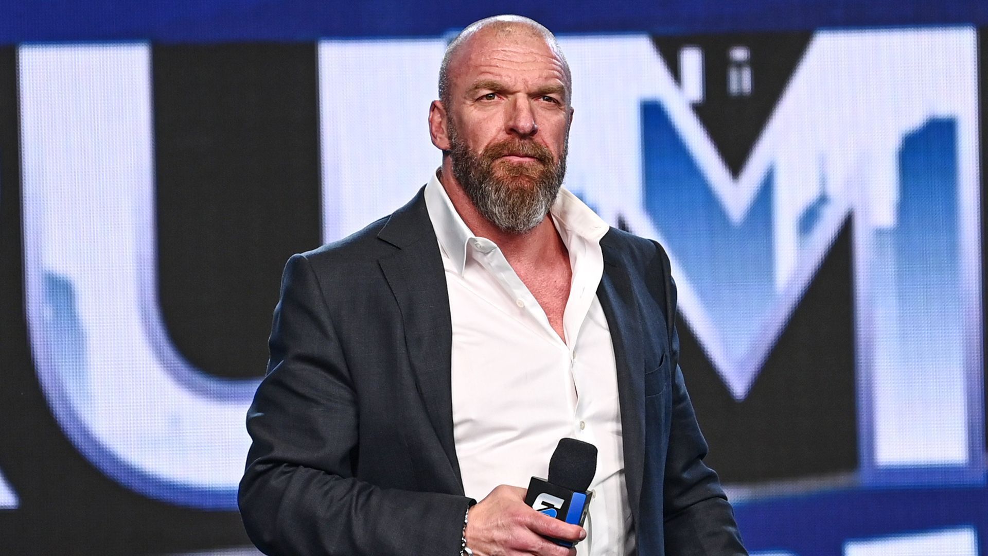 WWE Chief Content Officer Triple H speaks to the fans