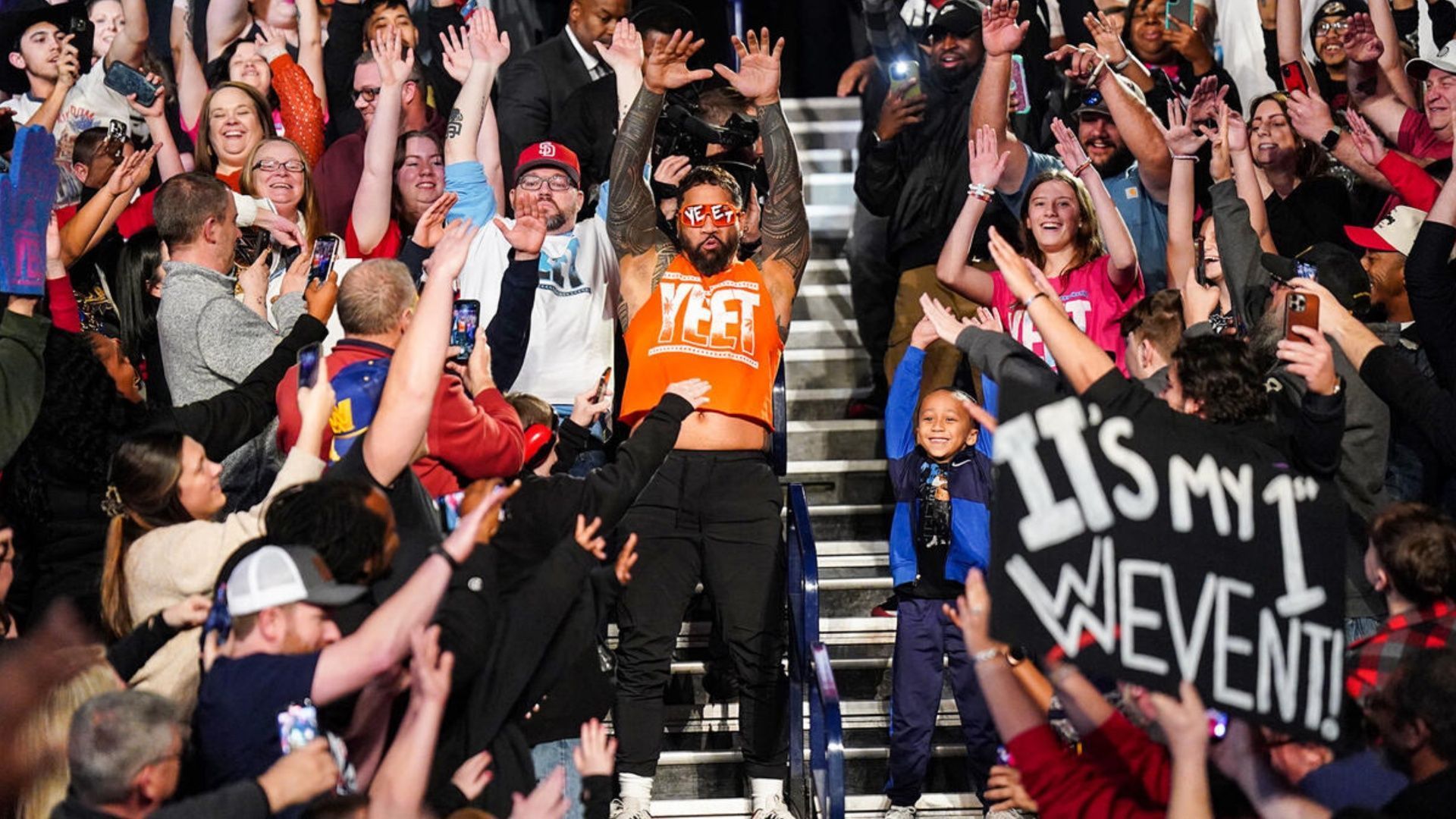 Jey Uso makes his entrance through the crowd (Image via WWE.com).