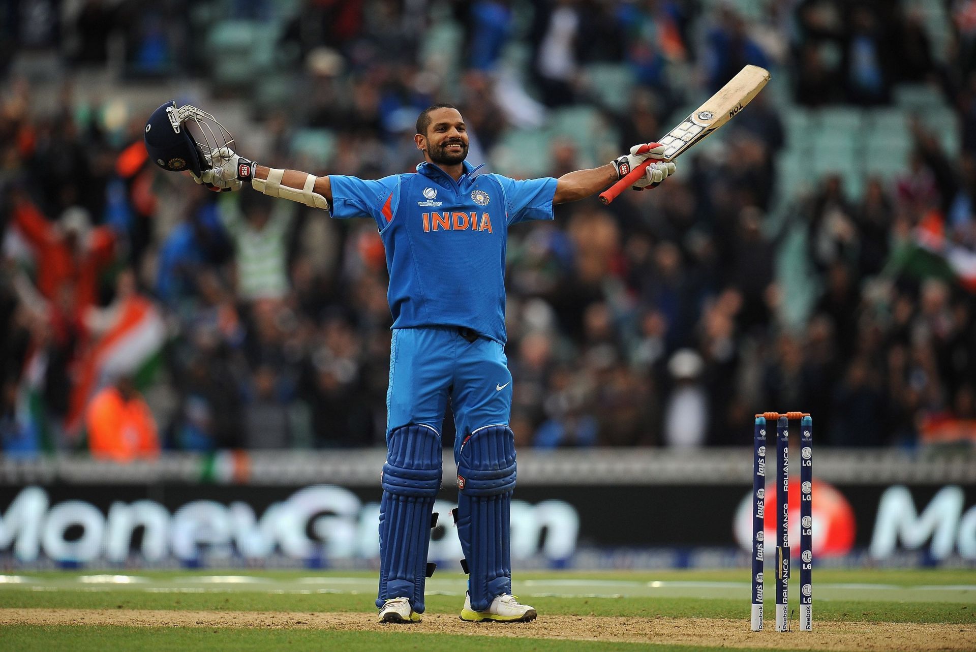 Dhawan celebrates scoring a century in the CT. Source: Getty