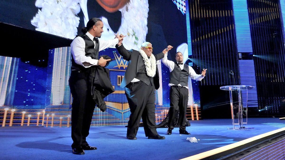 WWE Hall of Famer Rikishi with his sons Jey and Jimmy Uso. (Photo: WWE.com)