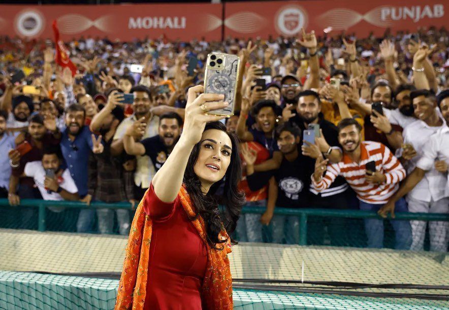 Preity Zinta posing with the crowd in Mohali during an IPL match (Image: @realpreityzinta/X)