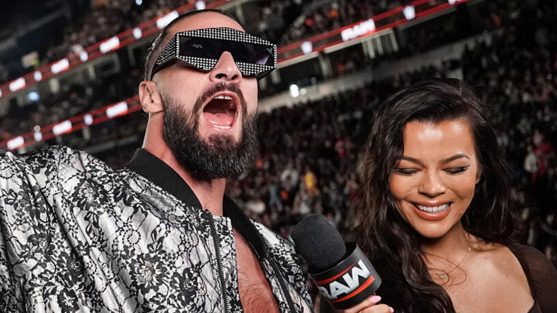 Seth Rollins and Jackie Redmond on RAW. [Photo via WWE.com]