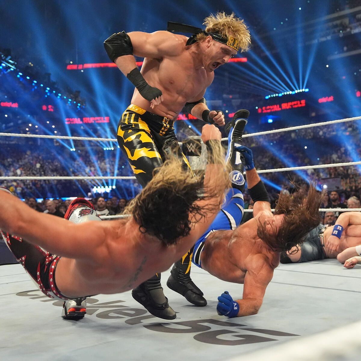 Seth Rollins, Logan Paul, and AJ Styles during this year&#039;s Royal Rumble. [Image credits: wwe.com]