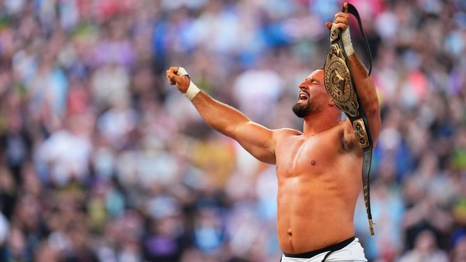 Top female WWE champion shares photo with Bron Breakker; both seen holding their respective titles