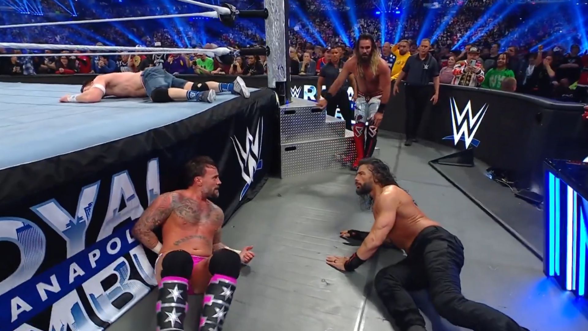 CM Punk, Roman Reigns, and Seth Rollins after getting eliminated from the 2025 Royal Rumble [Image Credits: WWE