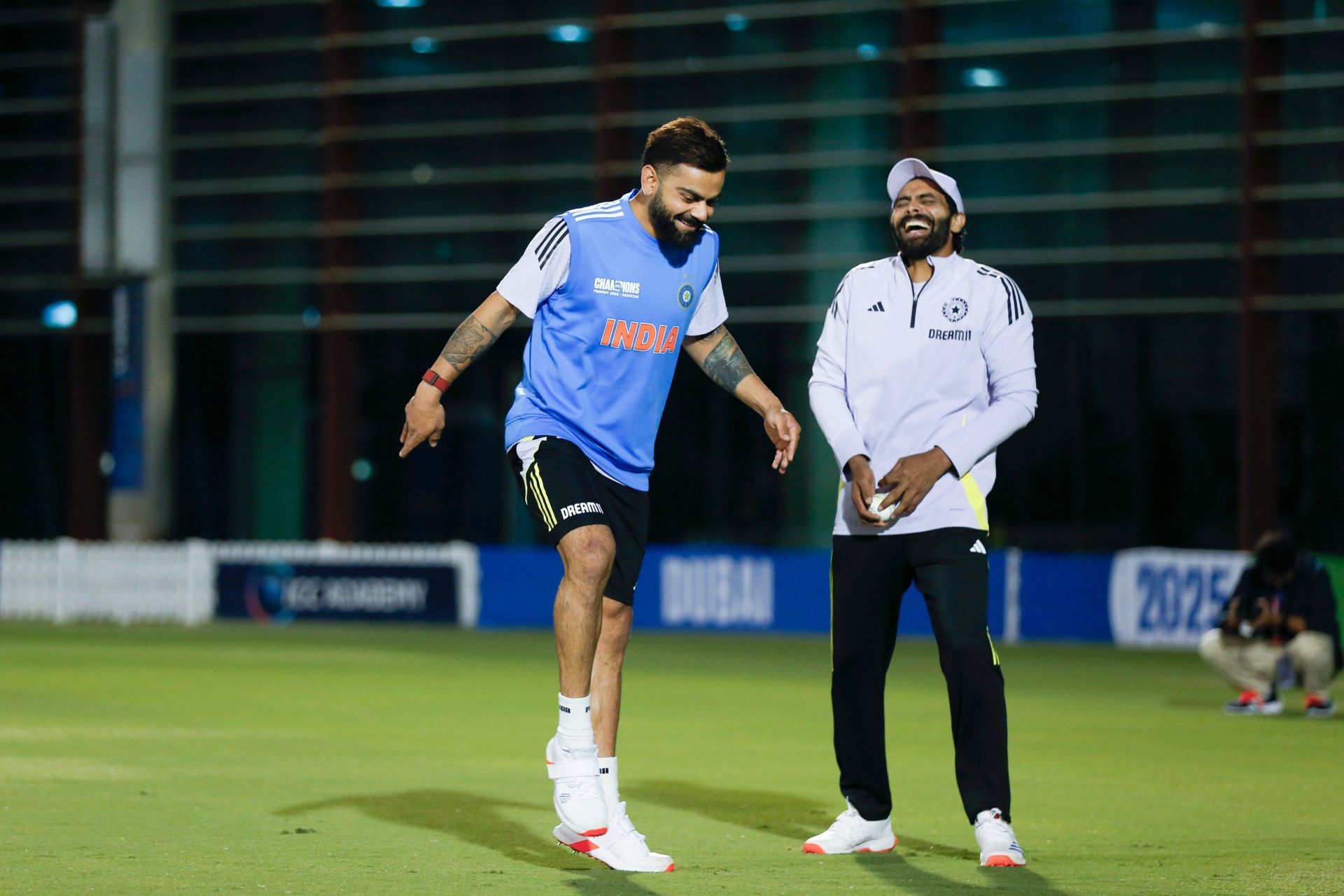 Virat Kohli and Ravindra Jadeja sharing a light moment in a training session. (Image: BCCI/X)