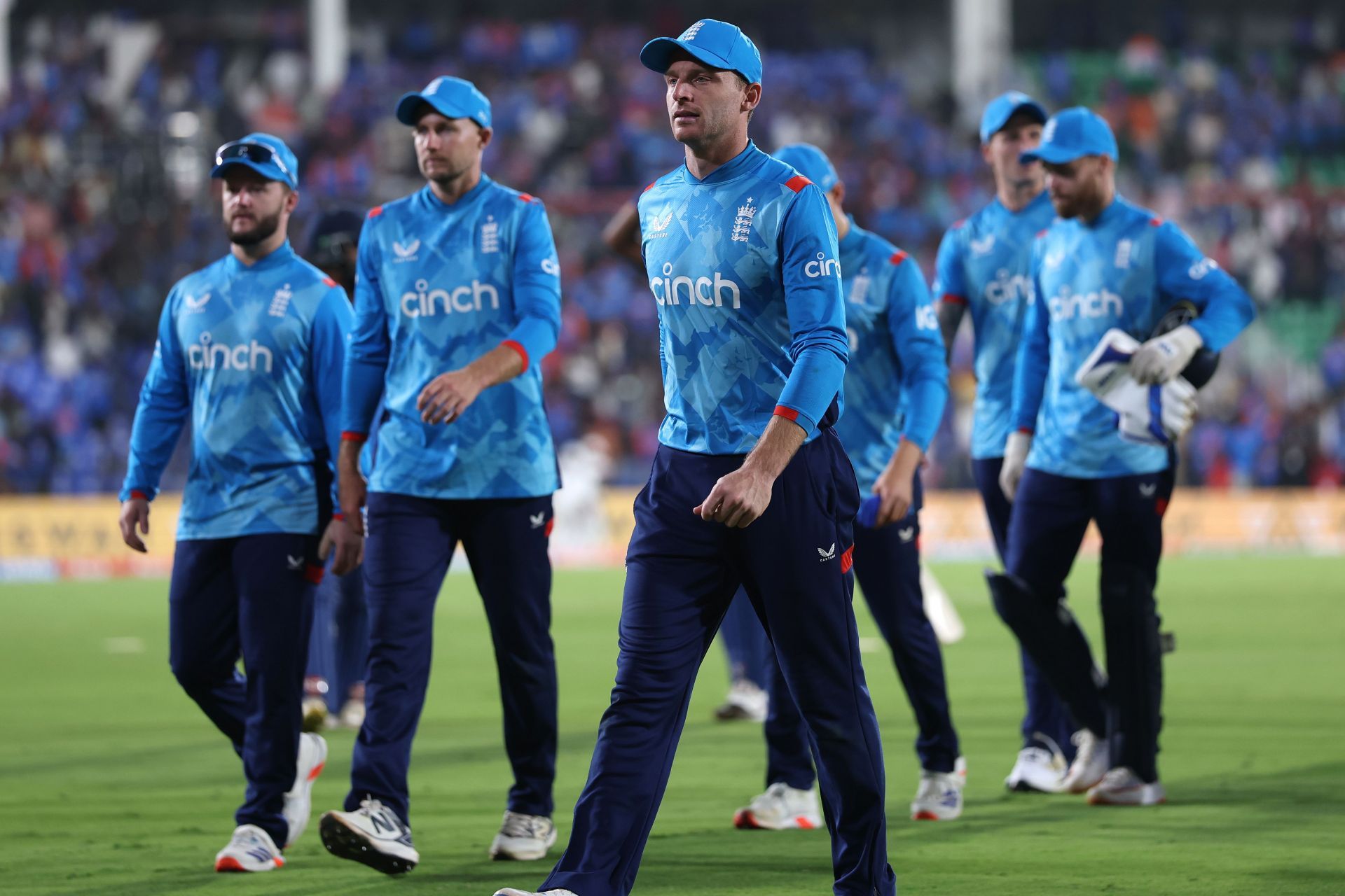 Jos Buttler leads England off the field. (Credits: Getty)