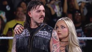 Liv Morgan writes "Us against the world" on X; Dominik Mysterio reacts during WWE RAW