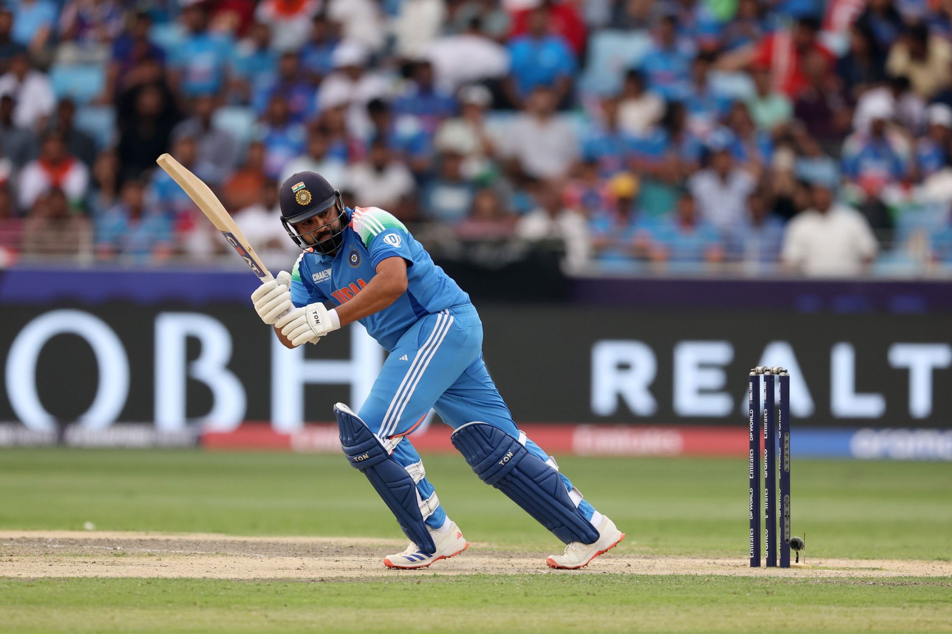 Rohit Sharma plays a shot during the CT clash against Bangladesh. Source: Getty