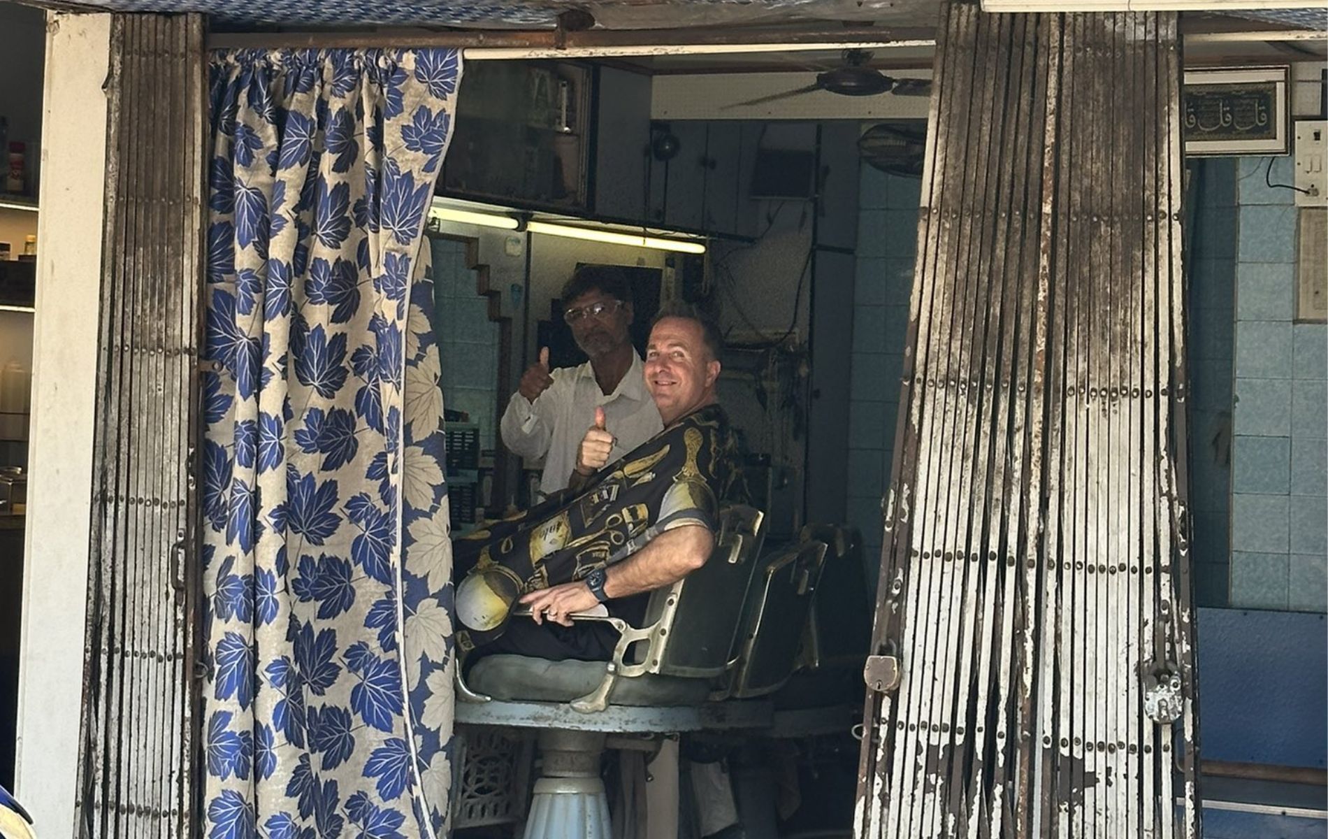 Michael Vaughan during his barbershop visit in Mumbai. (Pic: X/@MichaelVaughan).