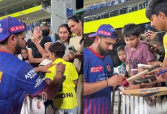 Rohit Sharma gives autograph to a young fan wearing MS Dhoni’s No. 7 jersey at Chepauk Stadium ahead of IPL 2025 [Watch]