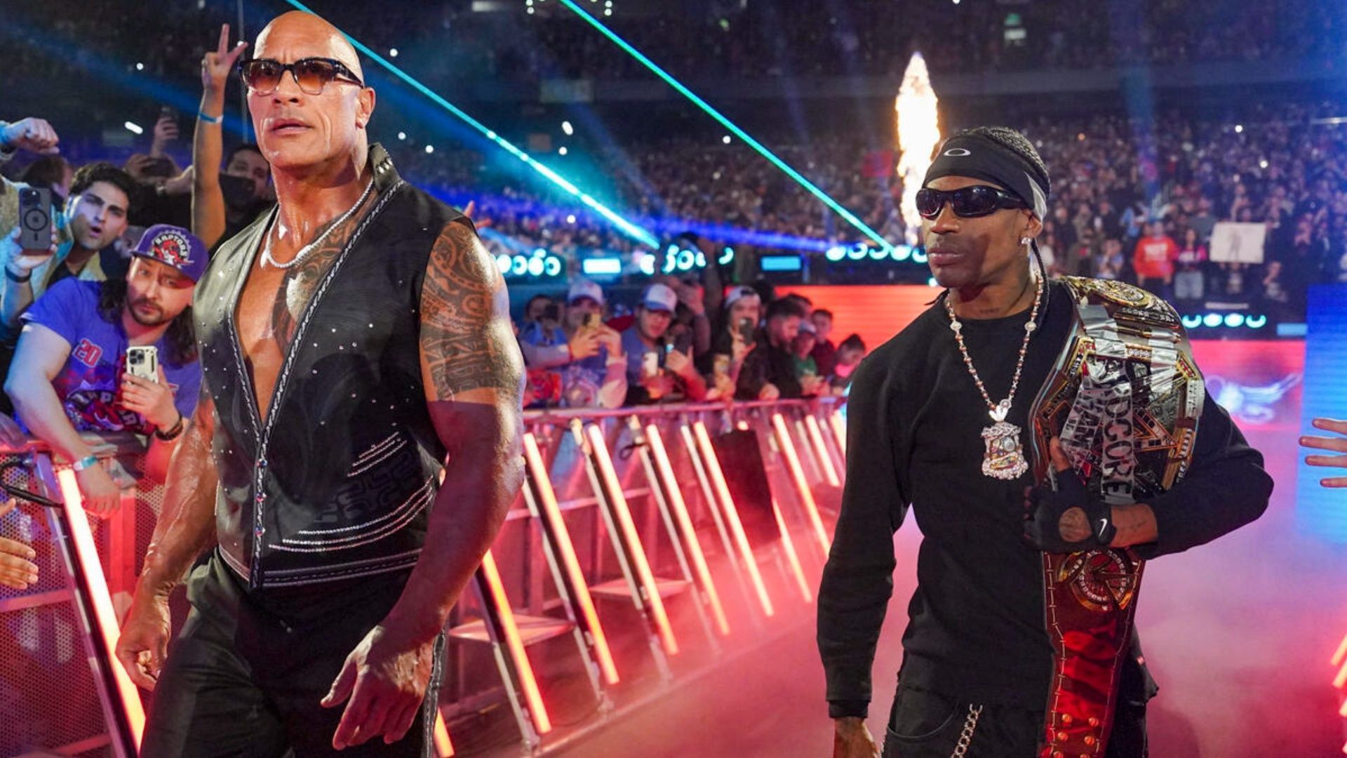 The Rock (left); Travis Scott (right) - Image via WWE.com