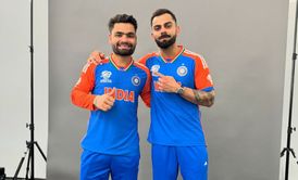 Virat Kohli poses with Rinku Singh and Harshit Rana ahead of IPL 2025 opener