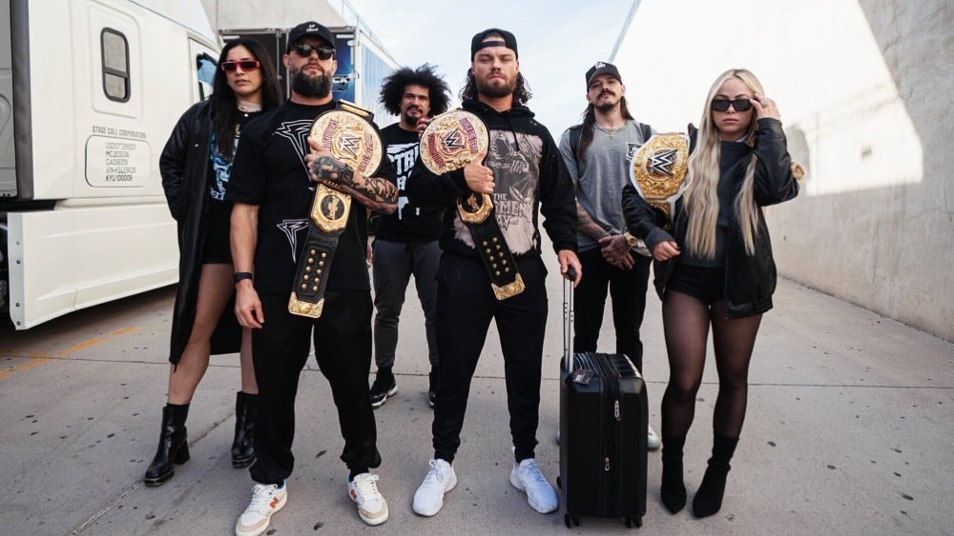 The Judgment Day poses outside of WWE RAW