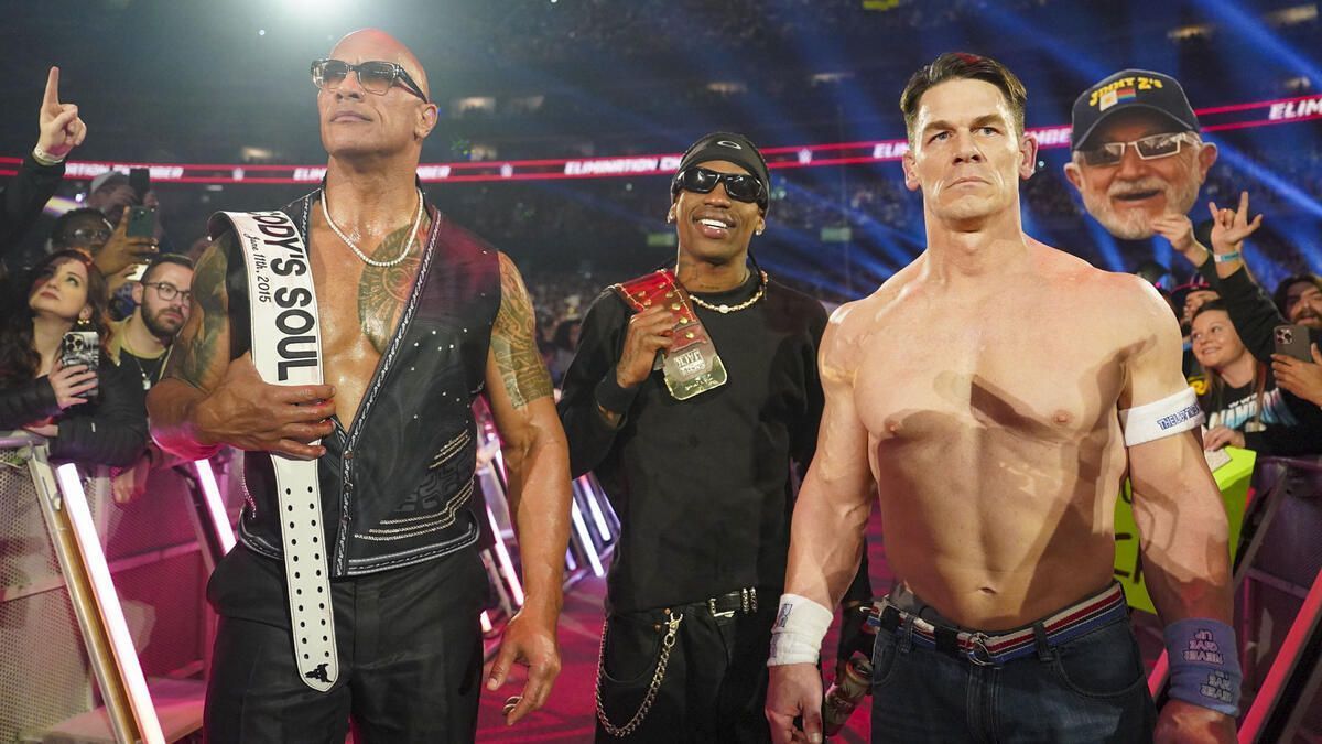 The Rock with Travis Scott and John Cena. (Image credits: wwe.com)