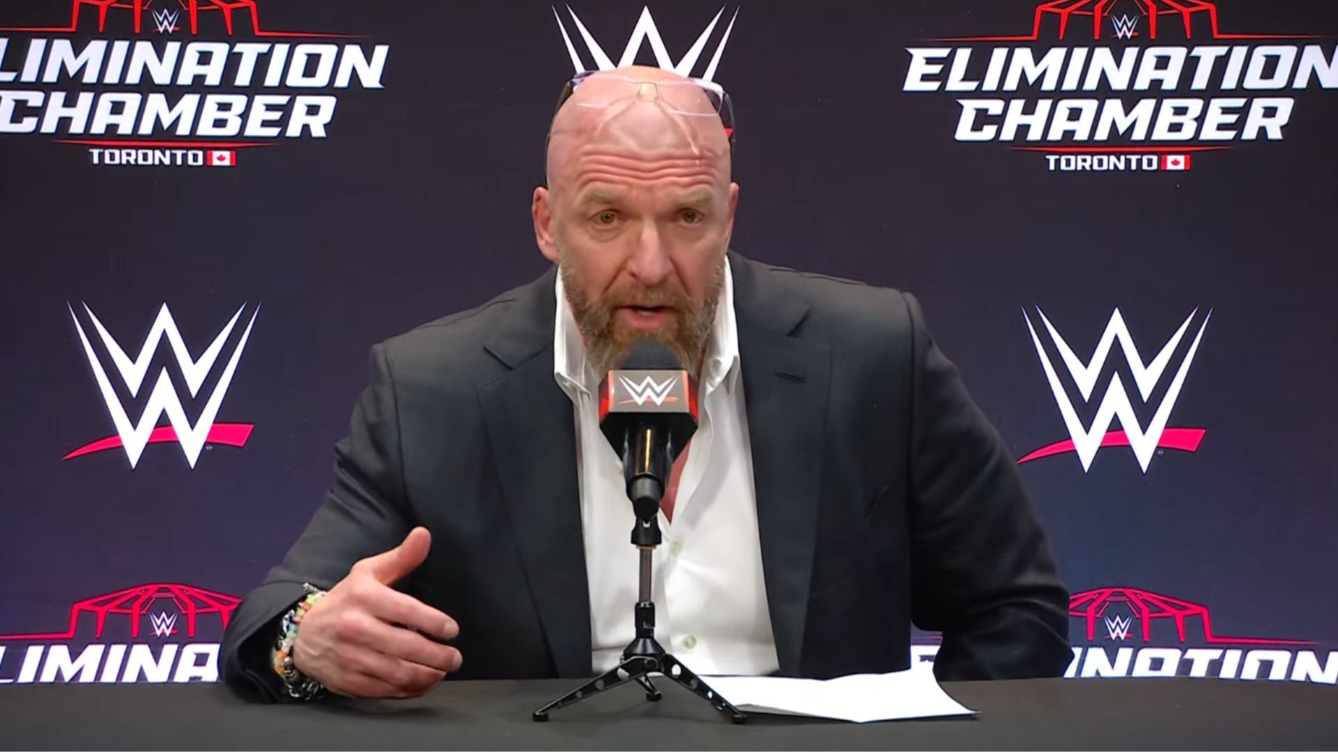 Triple H at the Elimination Chamber presser. [Image via WWE