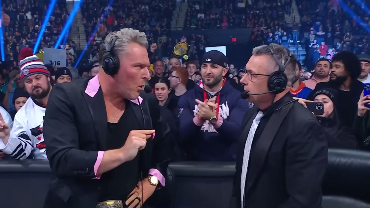 Pat McAfee behind the announce desk (via WWE