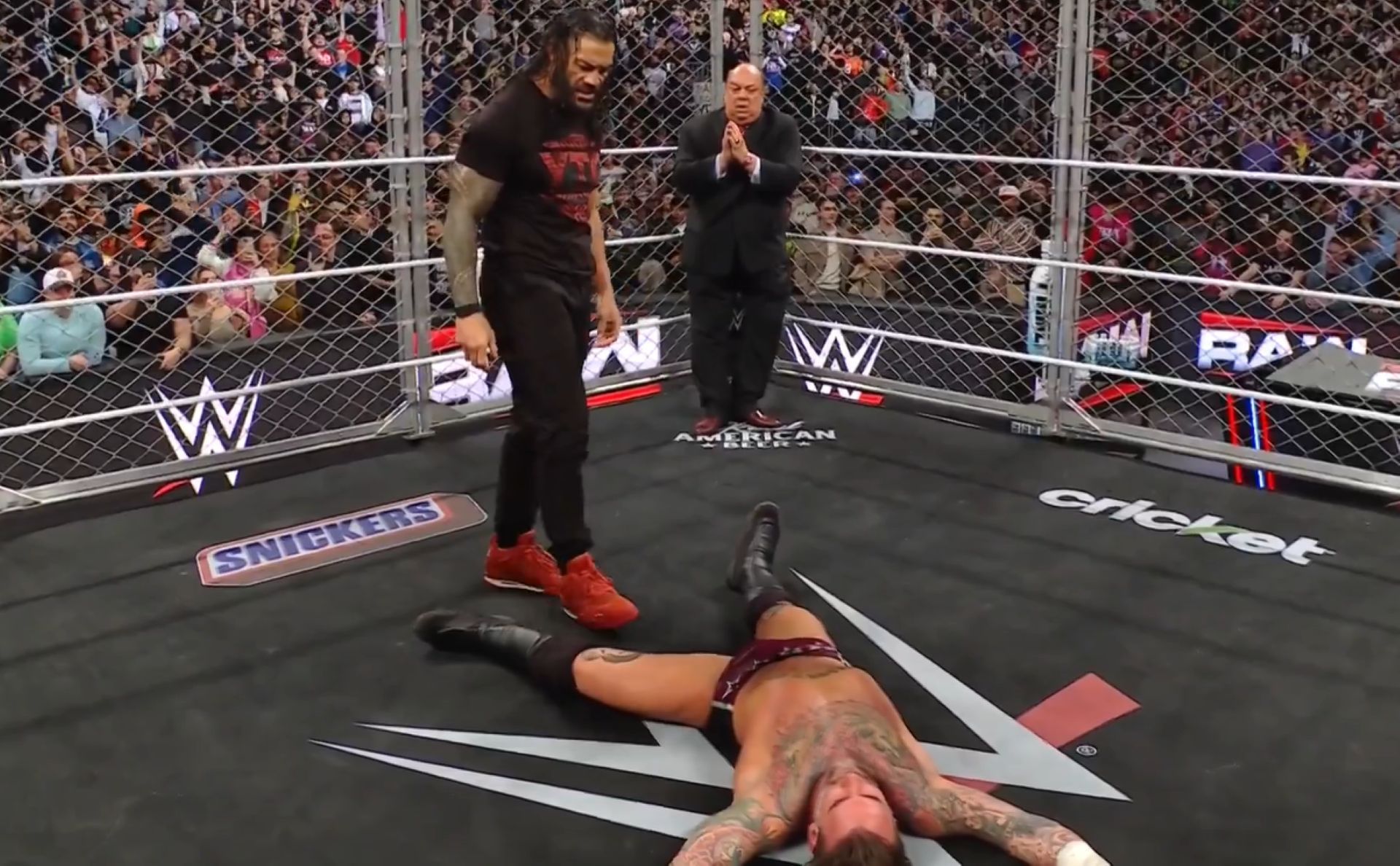 Roman Reigns shockingly attacked both Seth Rollins and CM Punk during their match on RAW. (Image Credit: WWE on X).