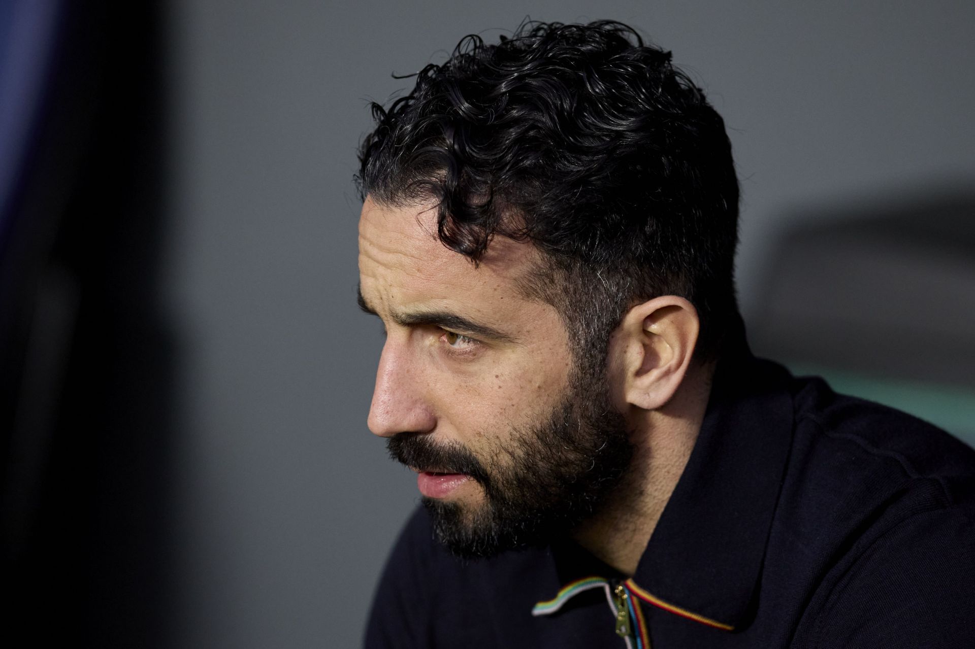 Manchester United boss Ruben Amorim looks on.