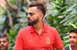 Virat Kohli signs painting despite security sidelining fan ahead of RCB IPL 2025 event [Watch]