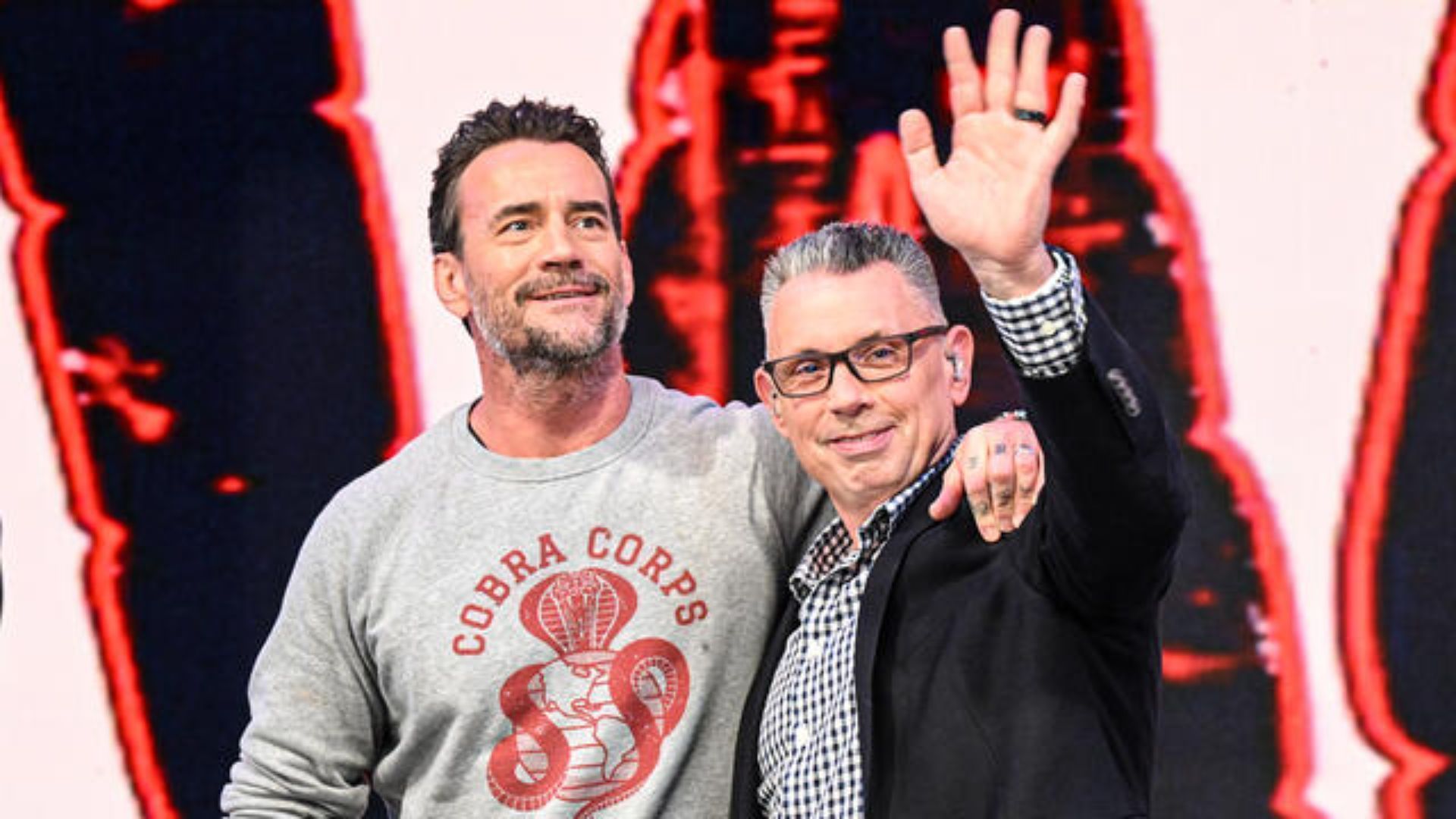 CM Punk and Michael Cole at the EC 2025 Kickoff [WWE/Courtesy]