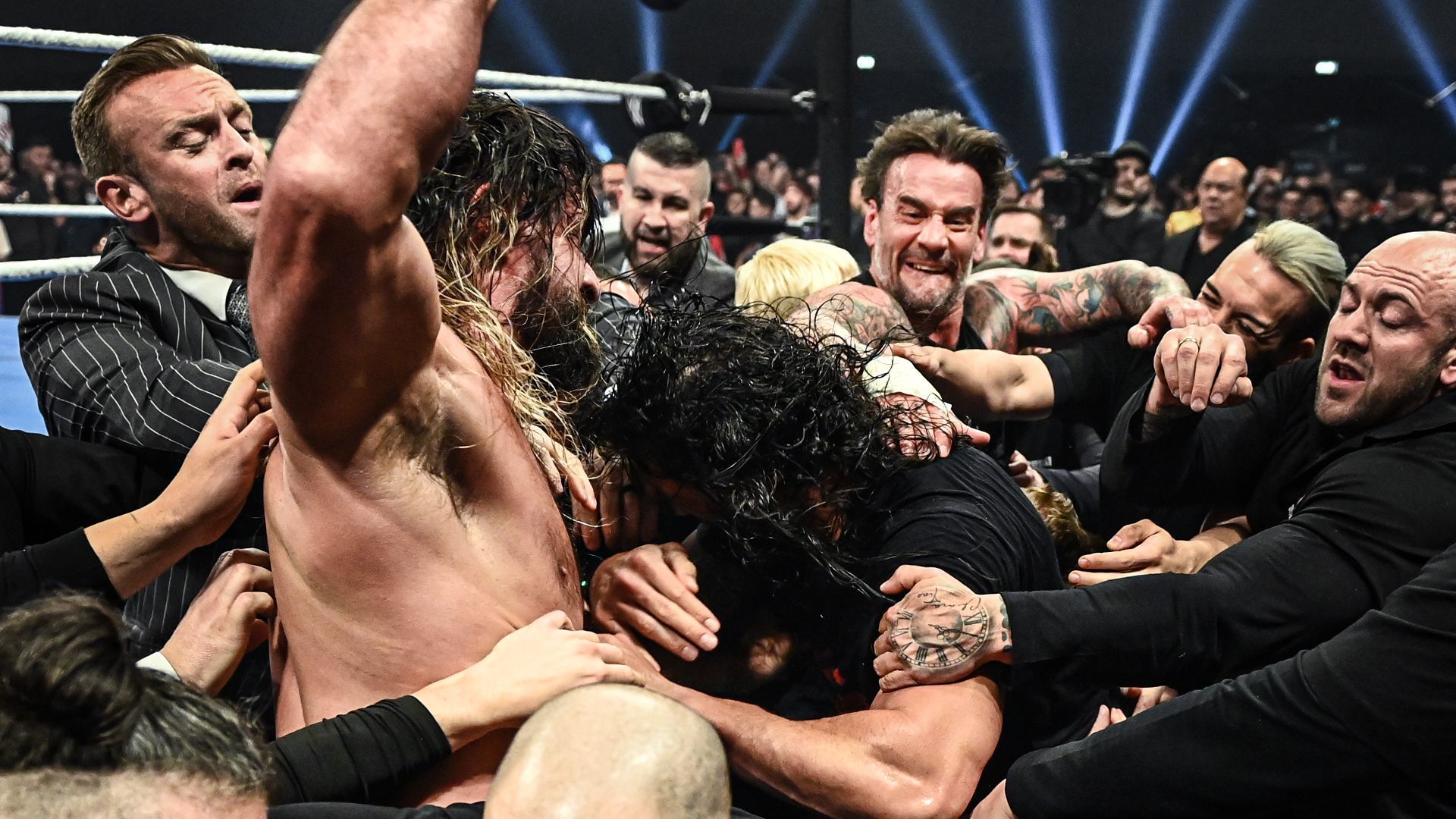 CM Punk, Seth Rollins and Roman Reigns fight on WWE SmackDown