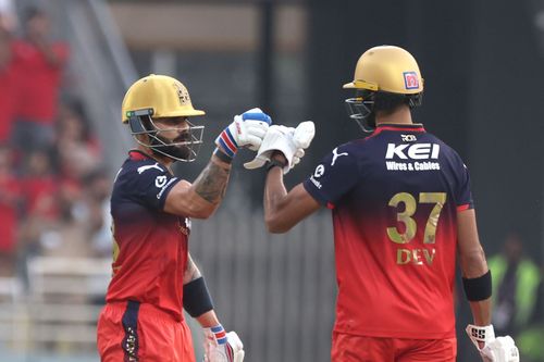 Virat Kohli (L) and Devdutt Padikkal (R) have put together 69 runs in 48 deliveries for Royal Challengers Bengaluru's second wicket - Source: Getty
